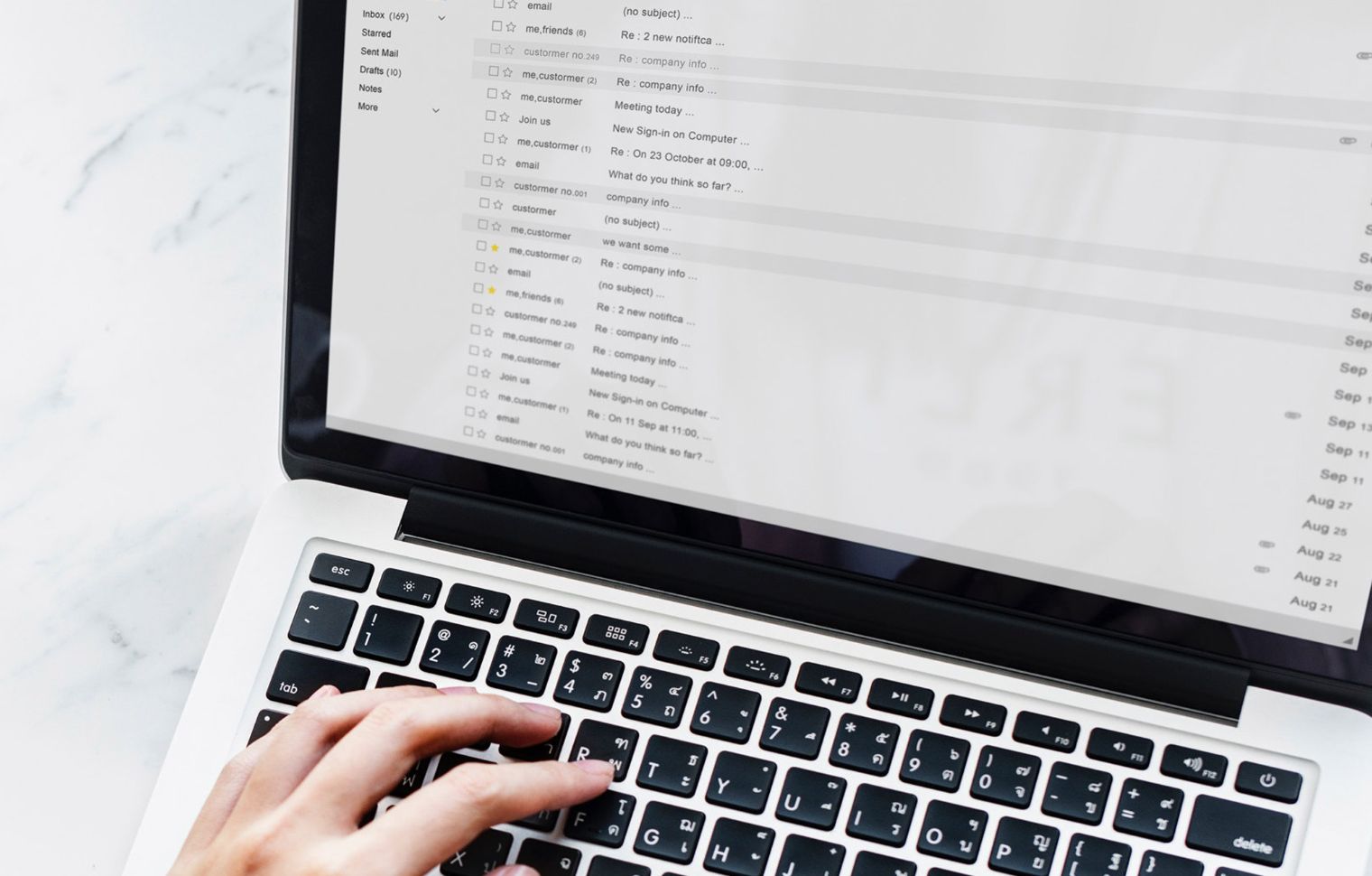 Checking email on a laptop